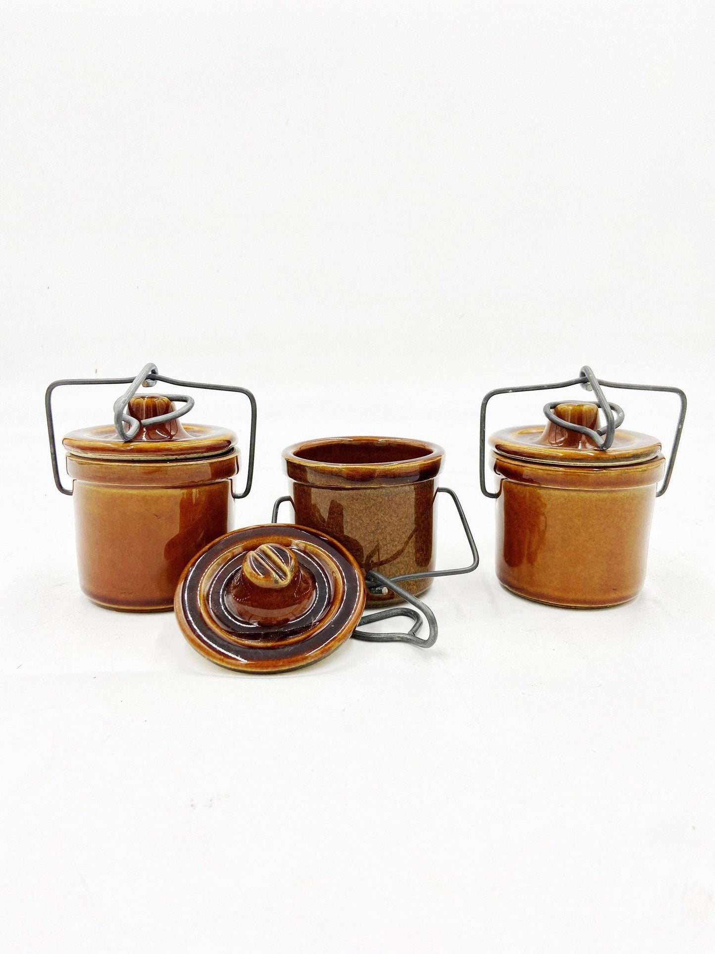 Brown Cheese Crocks, Set of 3 Canisters, Wire Closures, Farmhouse Country Pottery -Located at Funkyhouse Vintage Antique Store, Weiser Idaho
