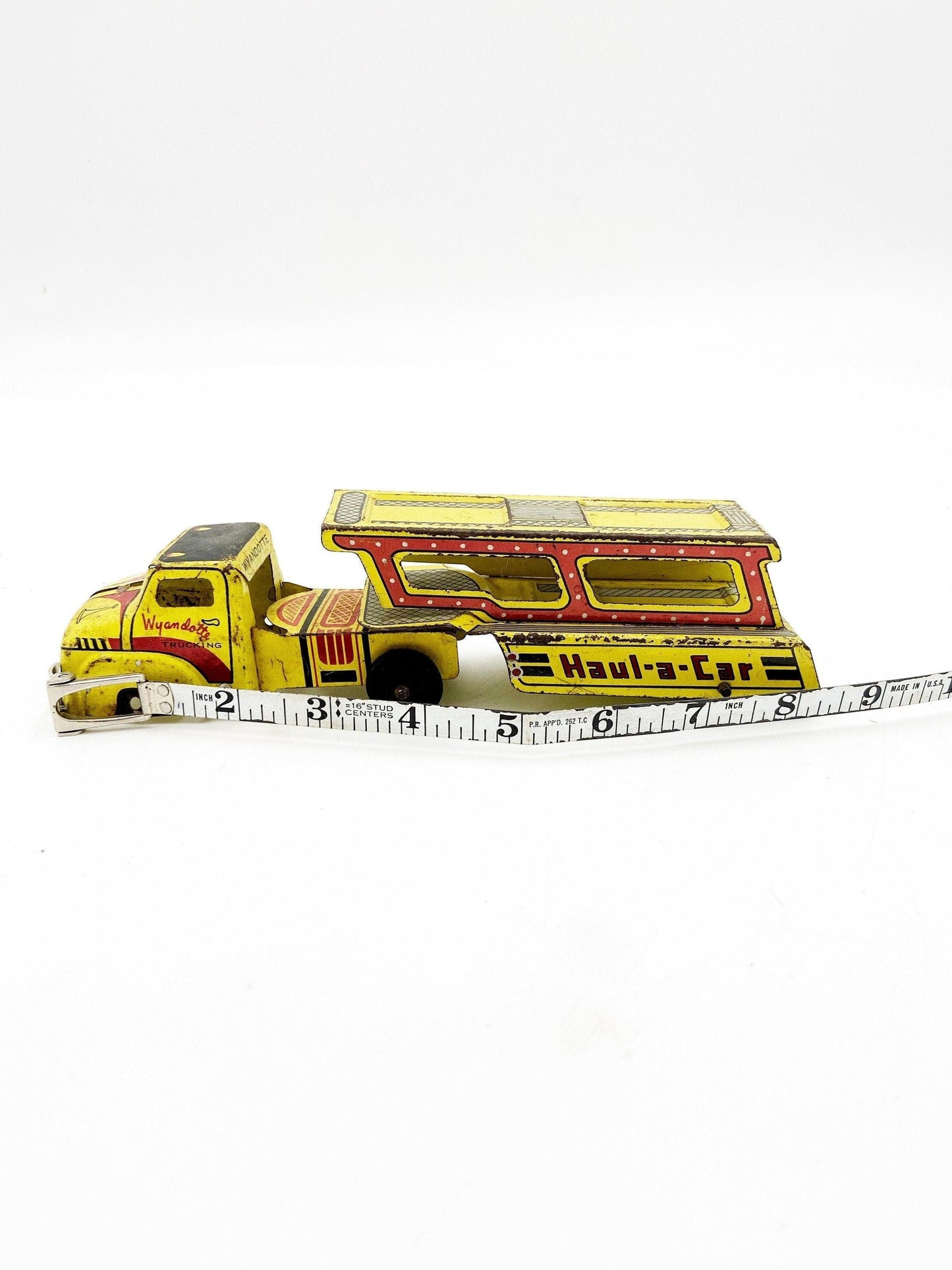 Vintage Tin Litho Wyandotte Trucking Car Hauler, Haul A Car, Tin Red Yellow Truck And Trailer Toy -Located at Funkyhouse Vintage Antique Store, Weiser Idaho