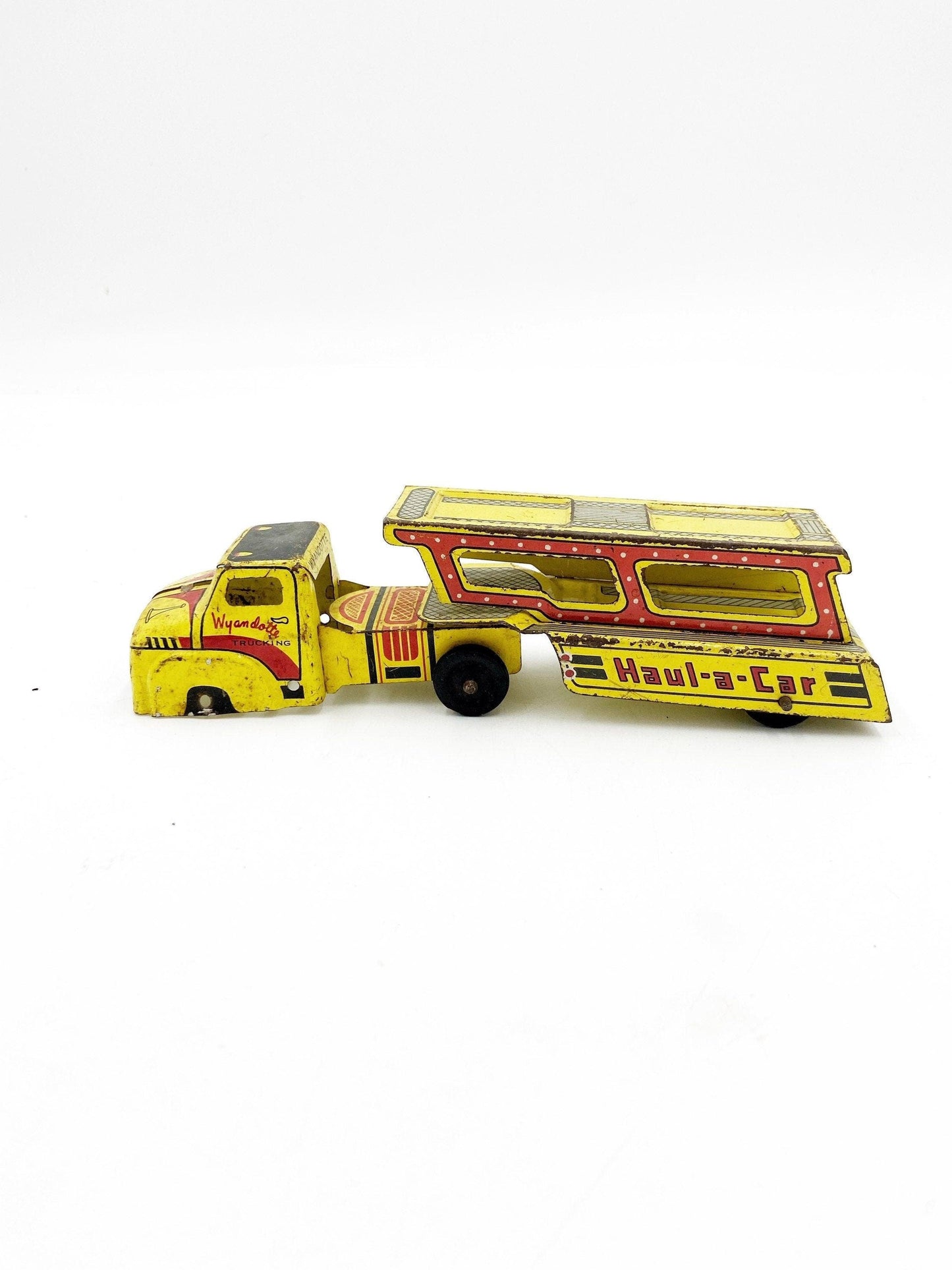 Vintage Tin Litho Wyandotte Trucking Car Hauler, Haul A Car, Tin Red Yellow Truck And Trailer Toy -Located at Funkyhouse Vintage Antique Store, Weiser Idaho