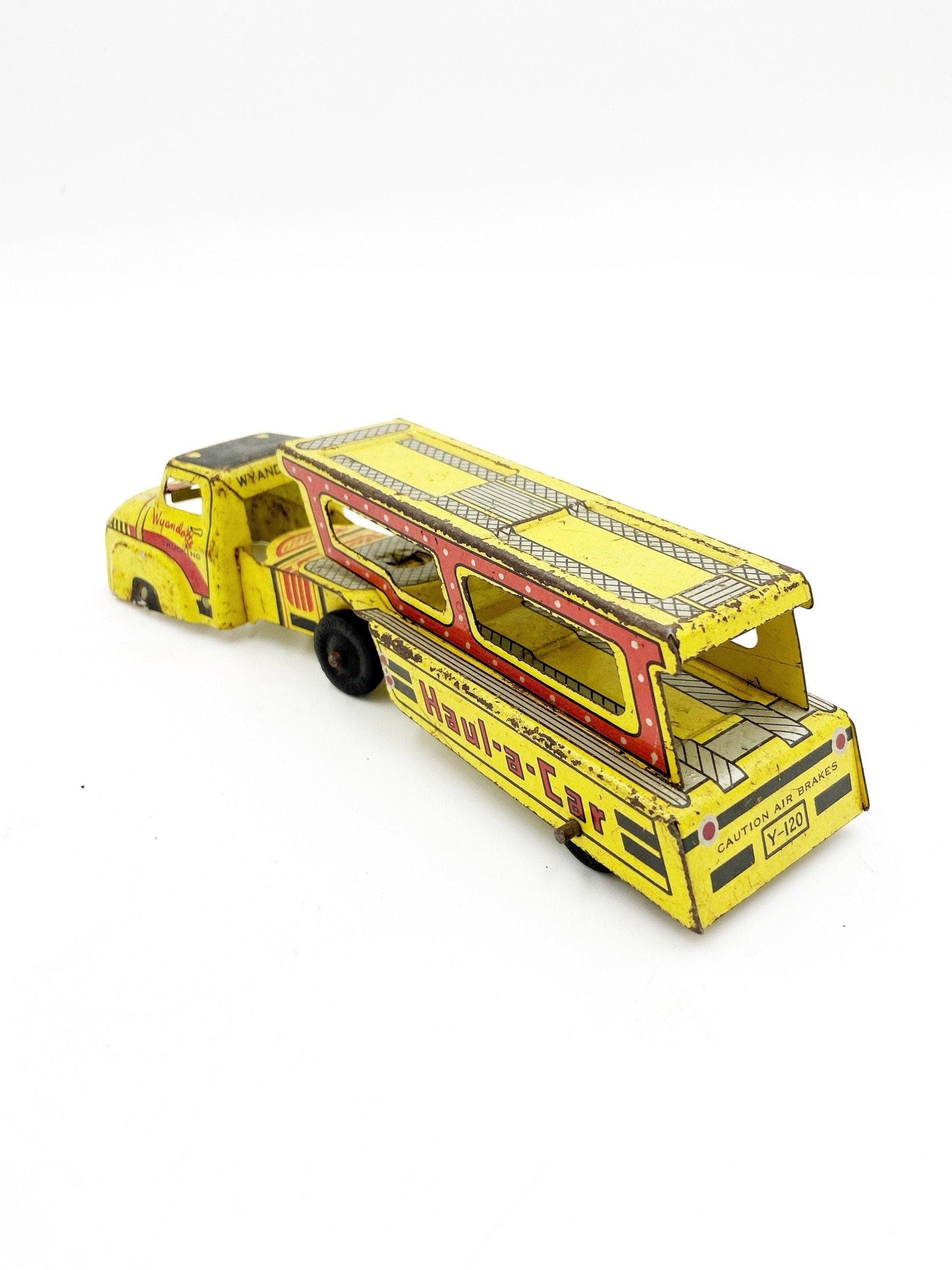 Vintage Tin Litho Wyandotte Trucking Car Hauler, Haul A Car, Tin Red Yellow Truck And Trailer Toy -Located at Funkyhouse Vintage Antique Store, Weiser Idaho