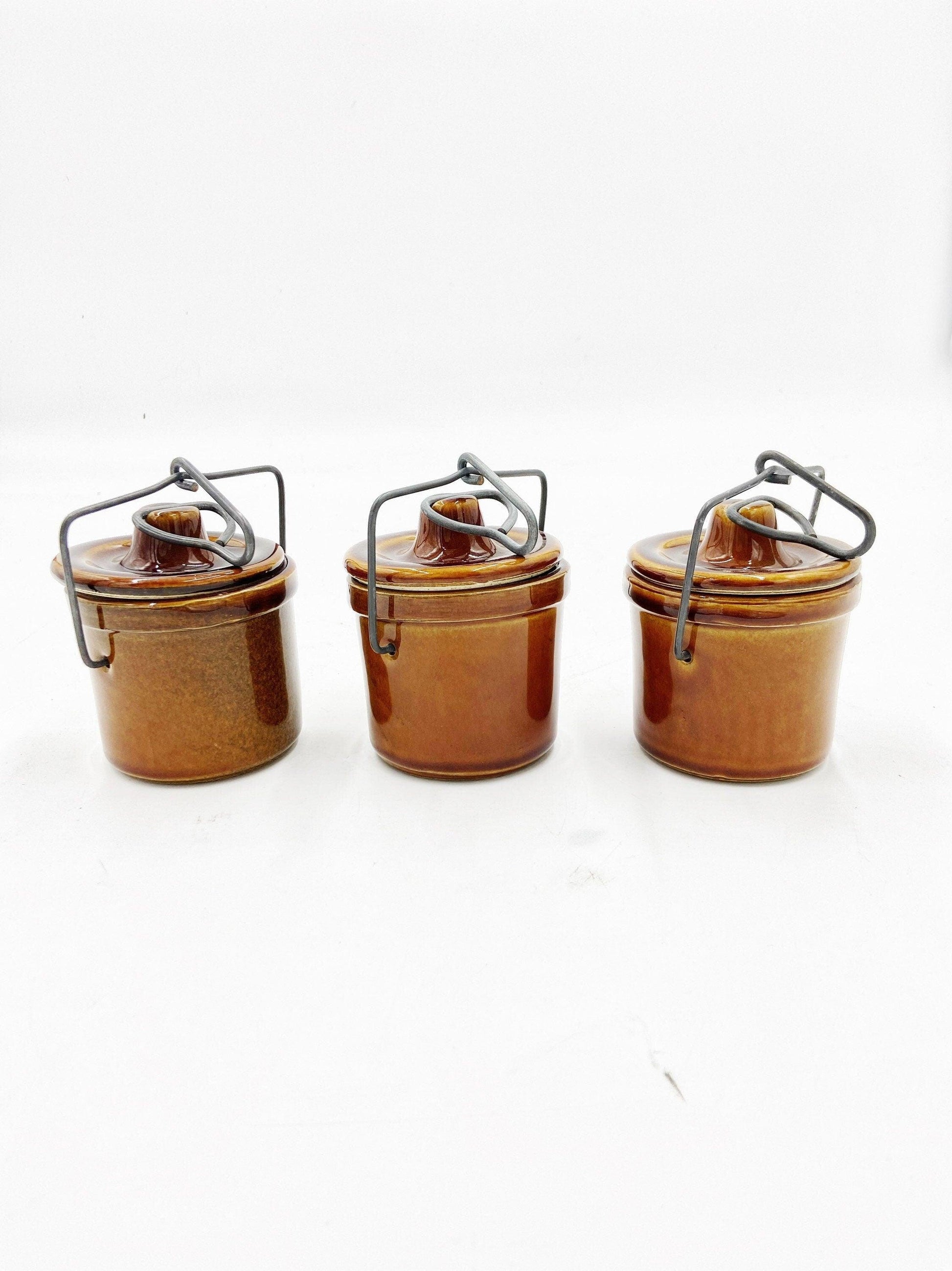 Brown Cheese Crocks, Set of 3 Canisters, Wire Closures, Farmhouse Country Pottery -Located at Funkyhouse Vintage Antique Store, Weiser Idaho