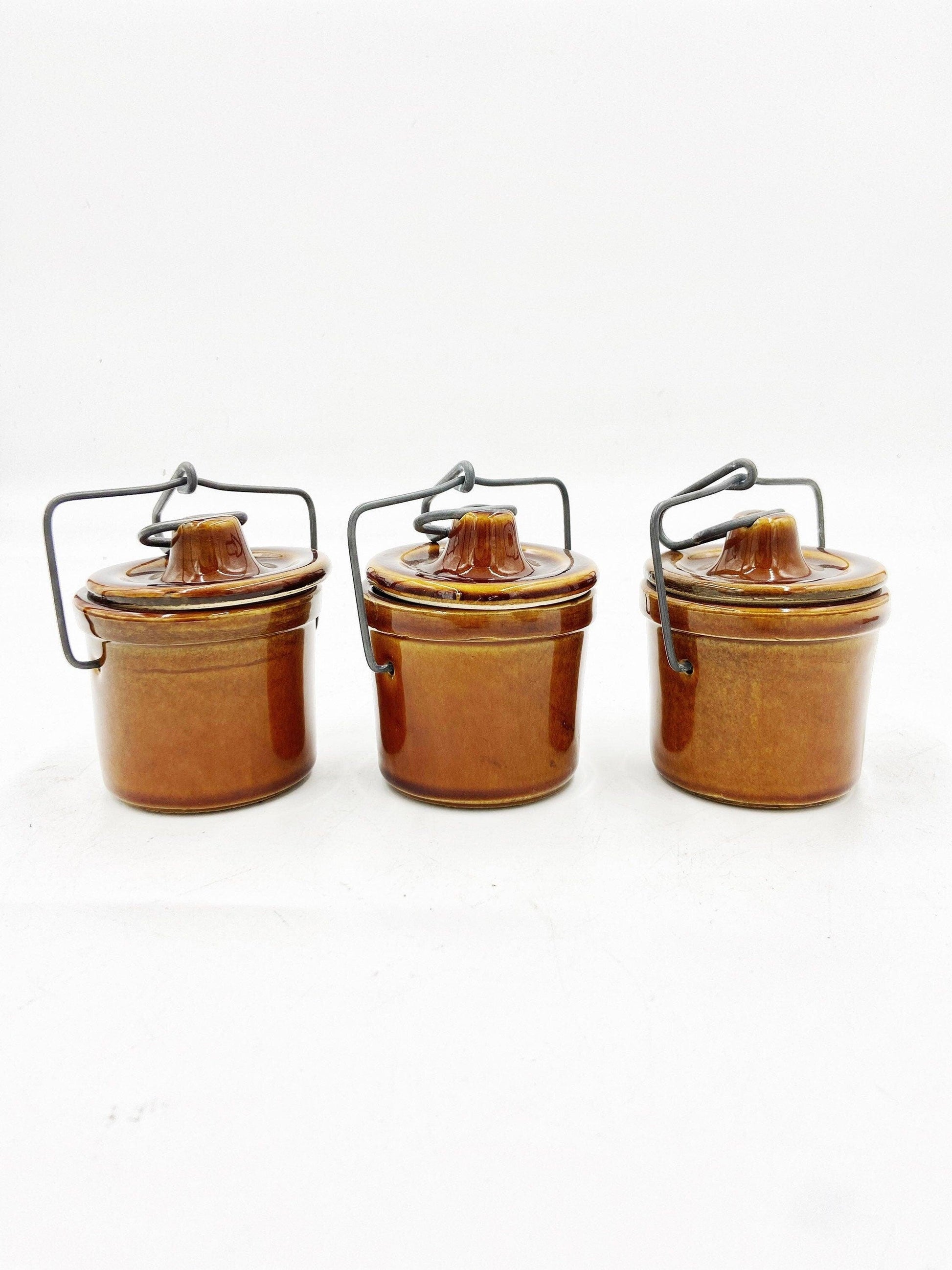Brown Cheese Crocks, Set of 3 Canisters, Wire Closures, Farmhouse Country Pottery -Located at Funkyhouse Vintage Antique Store, Weiser Idaho