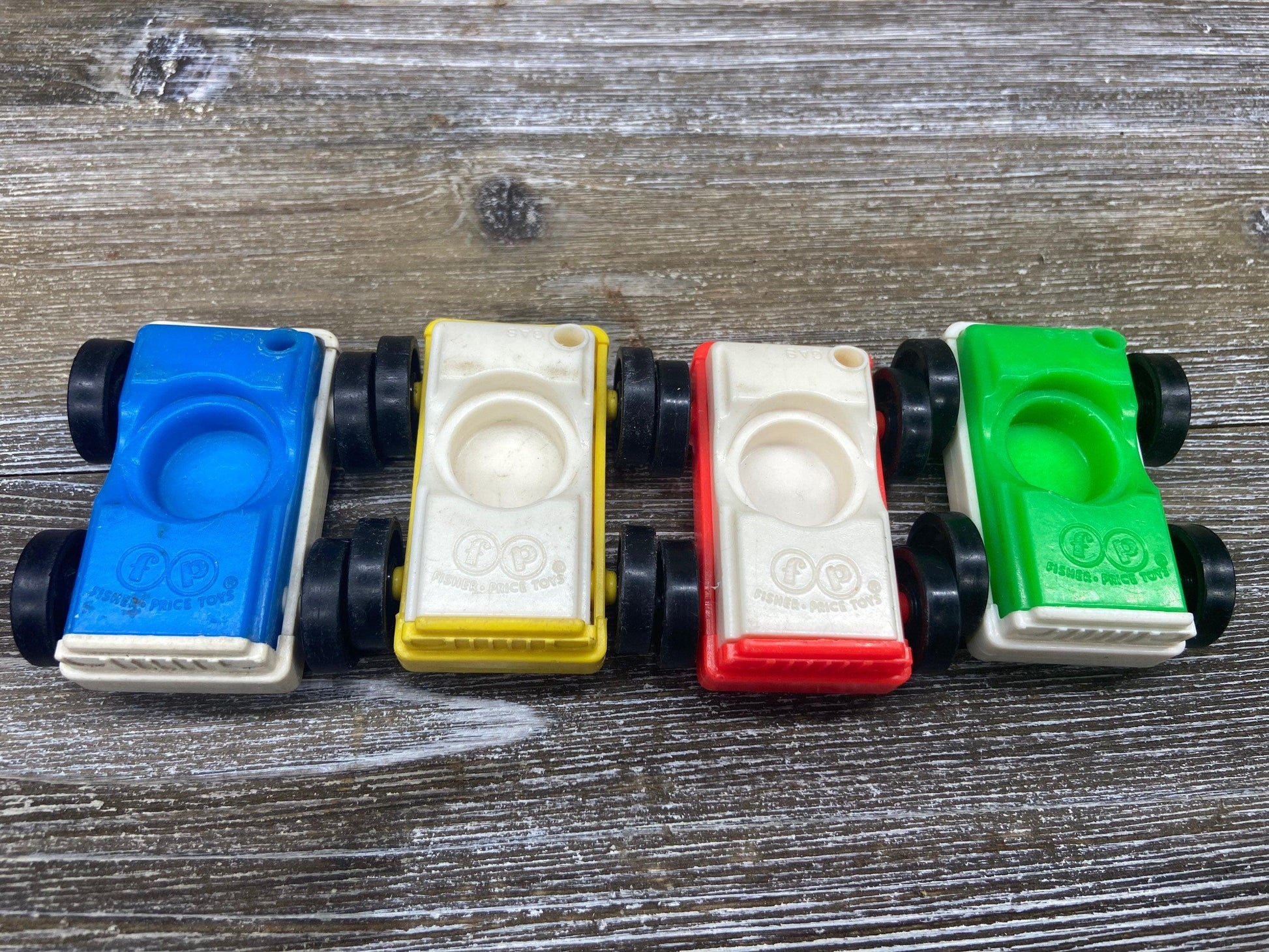 Fisher Price Vehicle Set, Four Vintage Little People Cars in White, Green, Blue and Yellow -Located at Funkyhouse Vintage Antique Store, Weiser Idaho