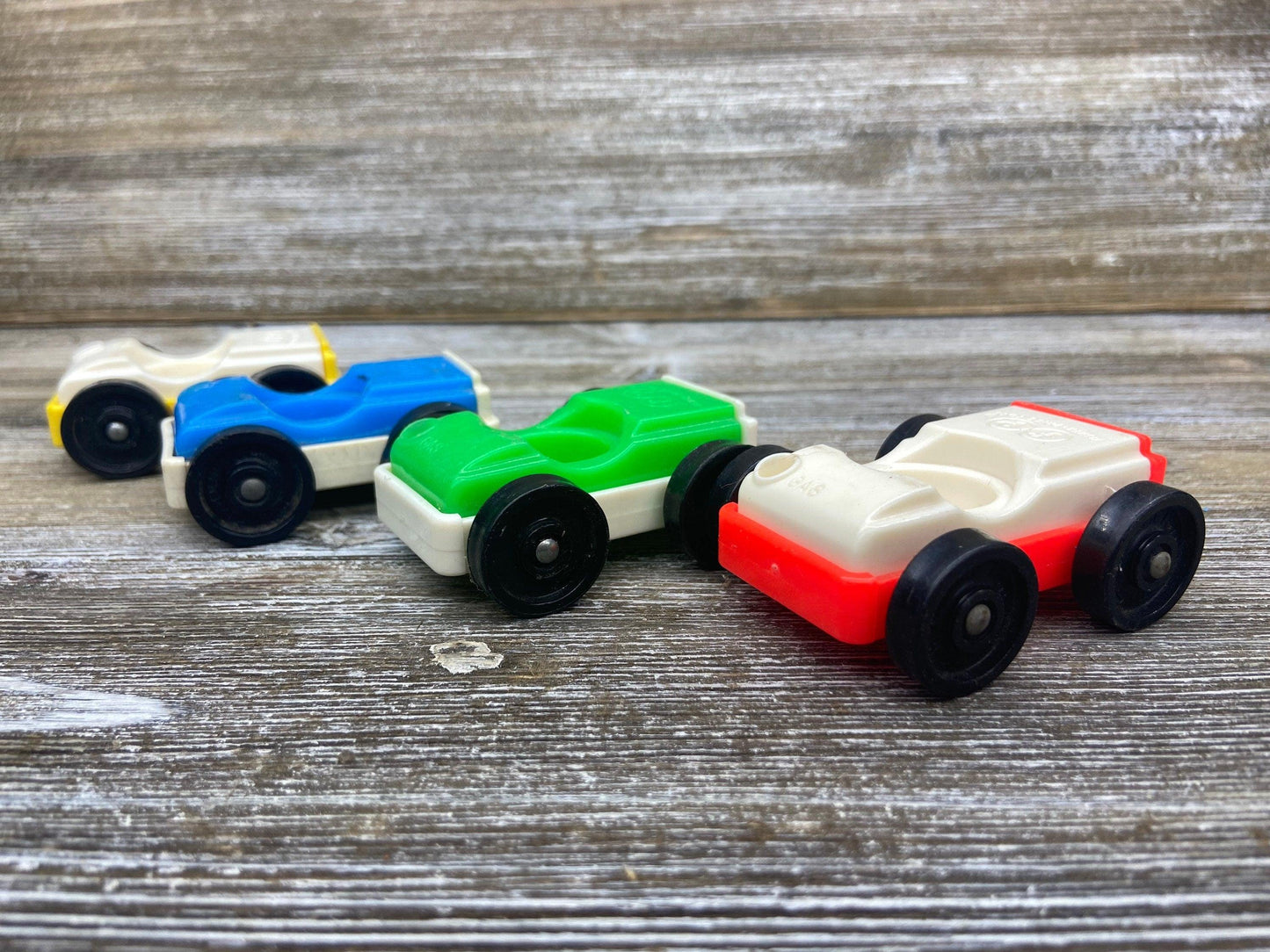 Fisher Price Vehicle Set, Four Vintage Little People Cars in White, Green, Blue and Yellow -Located at Funkyhouse Vintage Antique Store, Weiser Idaho
