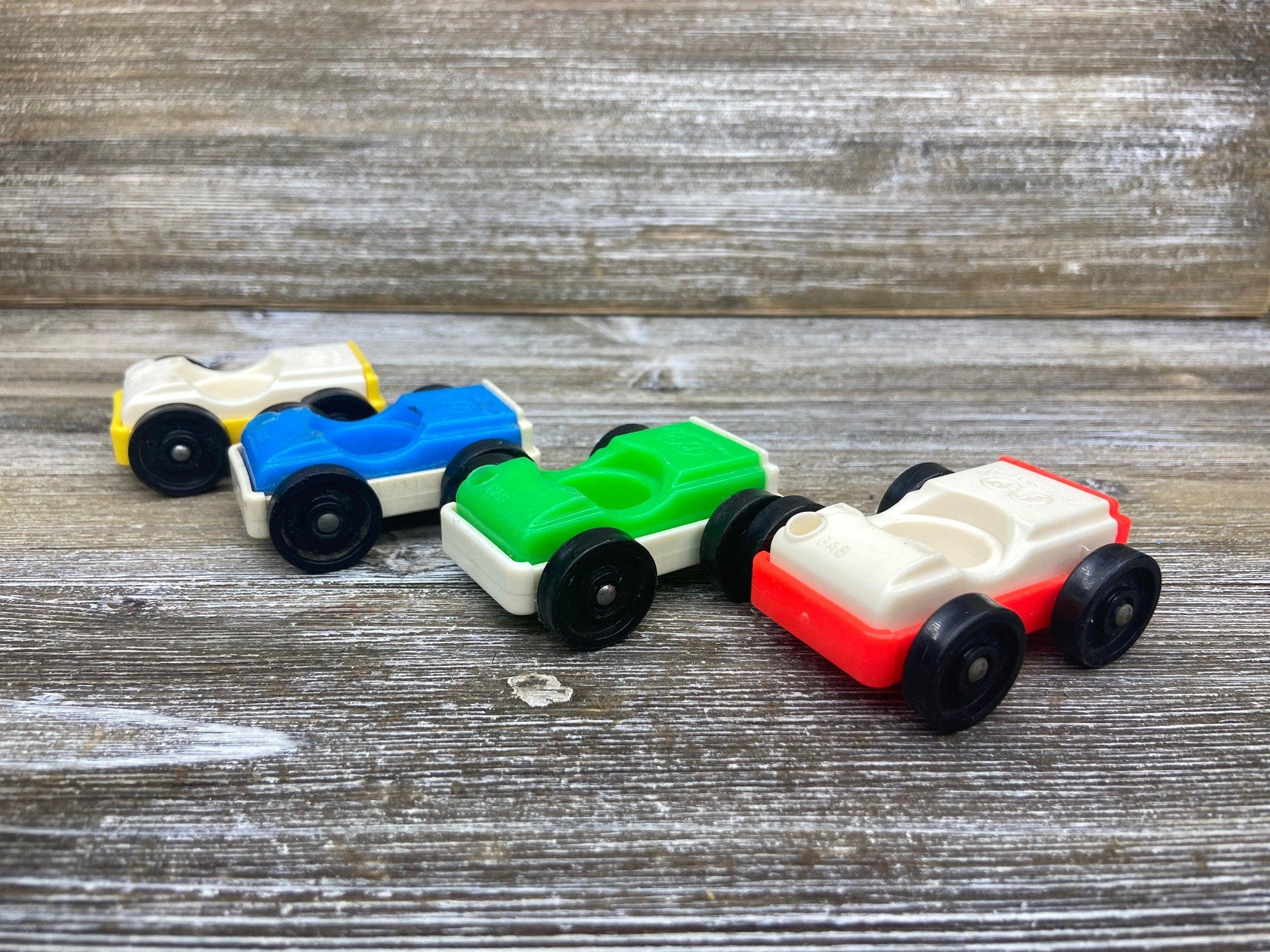 Fisher Price Vehicle Set, Four Vintage Little People Cars in White, Green, Blue and Yellow -Located at Funkyhouse Vintage Antique Store, Weiser Idaho
