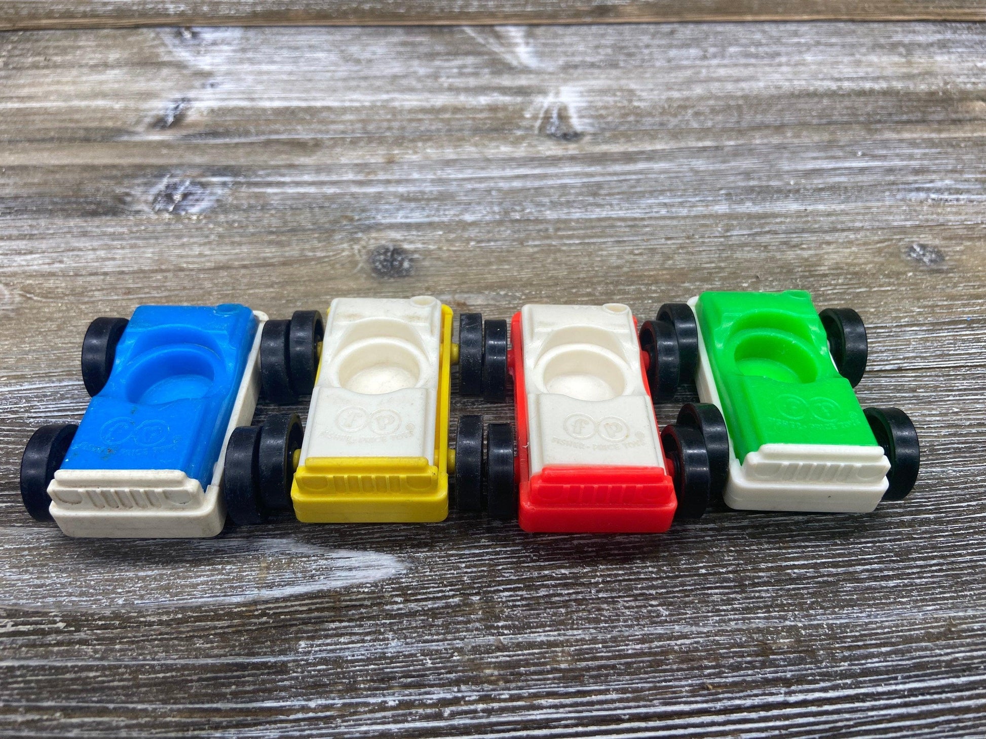 Fisher Price Vehicle Set, Four Vintage Little People Cars in White, Green, Blue and Yellow -Located at Funkyhouse Vintage Antique Store, Weiser Idaho