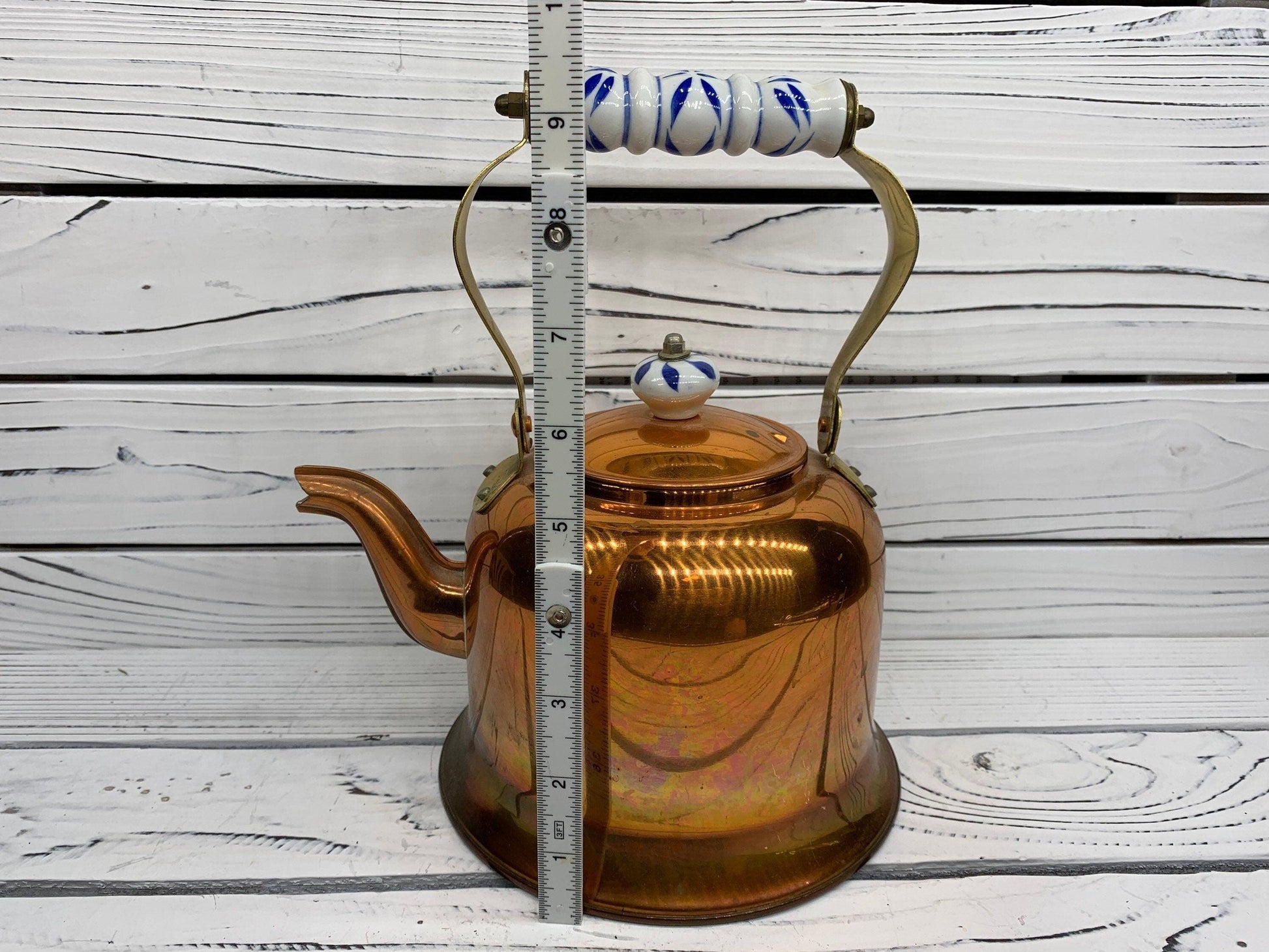 Vintage Copper Teapot With Blue and White Ceramic Handle -Located at Funkyhouse Vintage Antique Store, Weiser Idaho