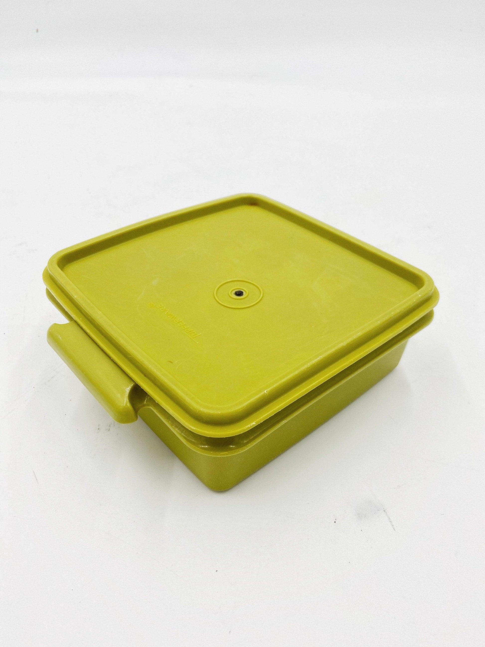 https://funkyhousevintage.com/cdn/shop/files/vintage-green-tupperware-square-stacking-bowl-antique-tupper-ware-food-storage-retro-kitchen-mid-century-modern-kitchen-decor-1970s-located-at-funkyhouse-vintage-antique-store-weiser_0aa7d38f-8bda-47bf-a72f-1be84326f4cf.jpg?v=1688592983&width=1946