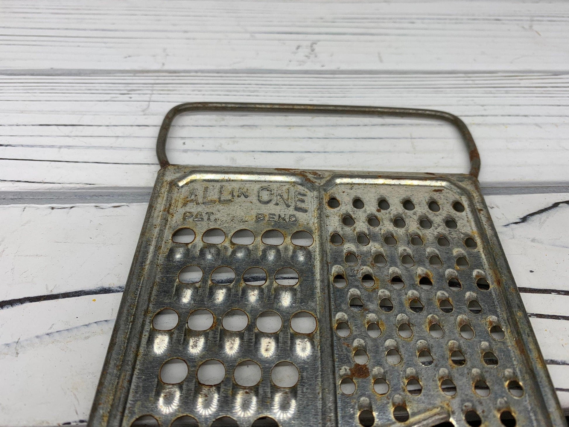 https://funkyhousevintage.com/cdn/shop/files/vintage-metal-cheese-grater-all-in-one-mid-century-grater-mid-century-kitchen-gadgets-shabby-chic-decor-located-at-funkyhouse-vintage-antique-store-weiser-idaho-4_0e8204a0-2114-42f4-aa17-2d3cf7a7753e.jpg?v=1688593360&width=1946